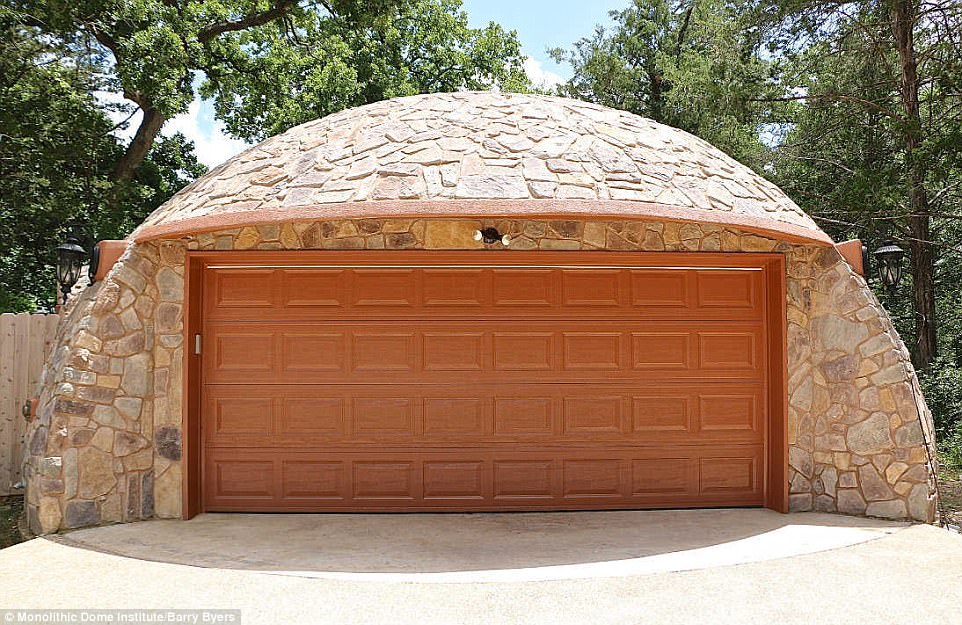 In addition to the main living space and a pool dome, the Whiteacre residence includes a two-car garage