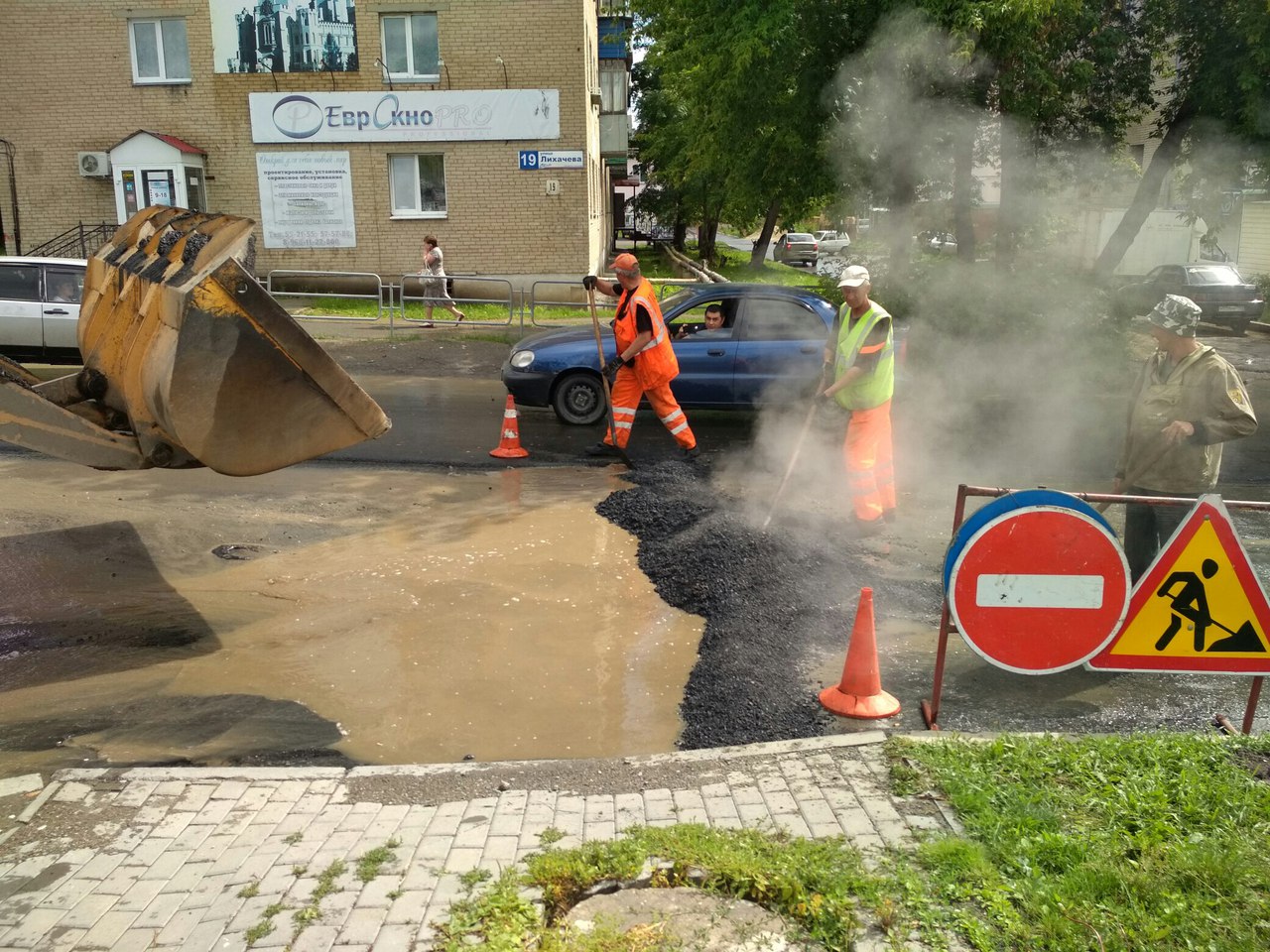 Укладка асфальта в лужи